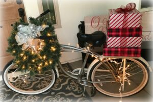 Journey to Christmas Porch Decor | blowingawayoutwest.com - Bicycle inspired Christmas porch decor. #christmasporchdecor #christmasporchdecorations #christmasbicycle #christmasporch #holidayporch #christmasdisplay #12daysofchristmas
