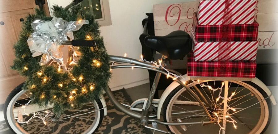 Journey to Christmas Porch Decor | blowingawayoutwest.com - Bicycle inspired Christmas porch decor. #christmasporchdecor #christmasporchdecorations #christmasbicycle #christmasporch #holidayporch #christmasdisplay #12daysofchristmas