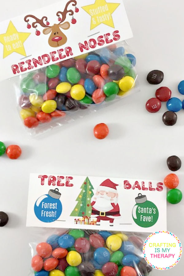 Christmas Kid Treat Bag Toppers Make these cute Reindeer Noses and Snowman Balls Kid Friendly Treat Bag Toppers with our free printable. | craftingismytherapy.com - #christmasdiy #christmasdiytreats #christmastreatbags #christmasideas #christmaskidscraft #christmascraft #freechristmasprintable #DIYchristmas #diykidscraft #kidscraft #christmaskidstreats #christmascraft #christmasgift