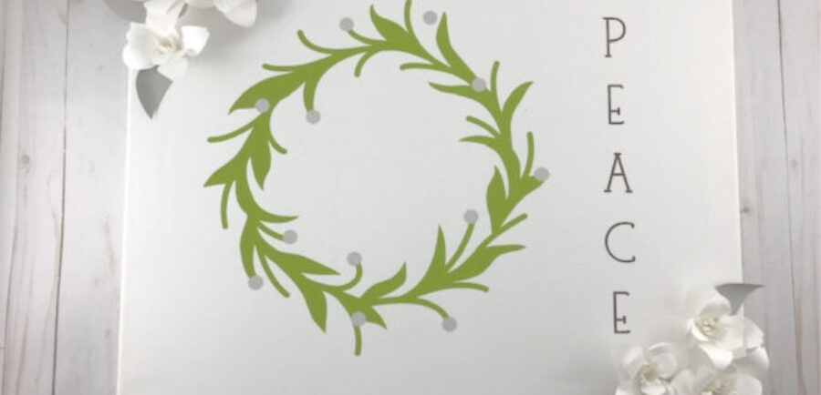 Magnolia Wreath Canvas.  DIY Magnolia Wreath Canvas Tutorial Using Your Cricut | craftingismytherapy.com -  #christmasdiy #christmasdiydecor #christmasroundup #christmasideas #christmasgames #christmascraft #christmaswreath #magnoliawreath #canvasart #DIYchristmas