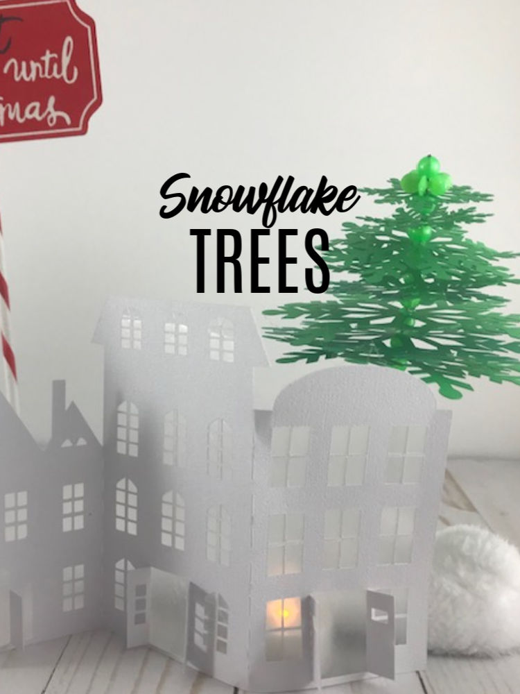 Snowflake Trees  Make these fun and easy Snowflake Trees with your Cricut.  | craftingismytherapy.com -  #christmasdiy #christmasdiydecor #christmastrees #christmasideas #snowflaketrees  #christmascraft #cricutchristmascraft #DIYchristmas #cricutcraft #easycricutcraft #christmascraft #christmastree